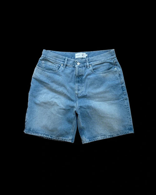 Aime Leon Dore blue denim shorts featuring New York Yankees logo and distressed details.