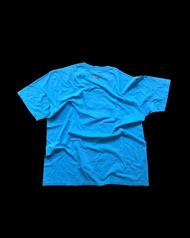 Supreme graphic tee blue featuring Malcom X print, part of Roy DeCarava collaboration.