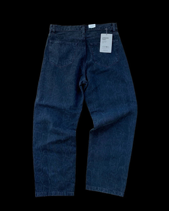 Carhartt WIP black and grey straight jeans with subtle snake print texture