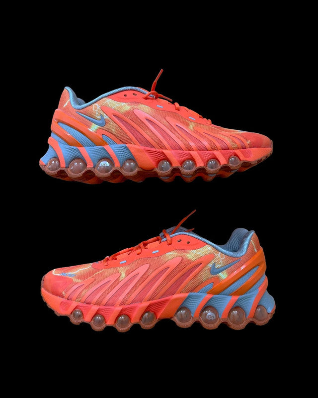 Nike Air Max Dn8 orange footwear with Palace logo and unique design details.