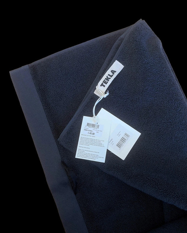 TEKLA navy hand towel 50x90cm in Night Blue, soft cotton material.