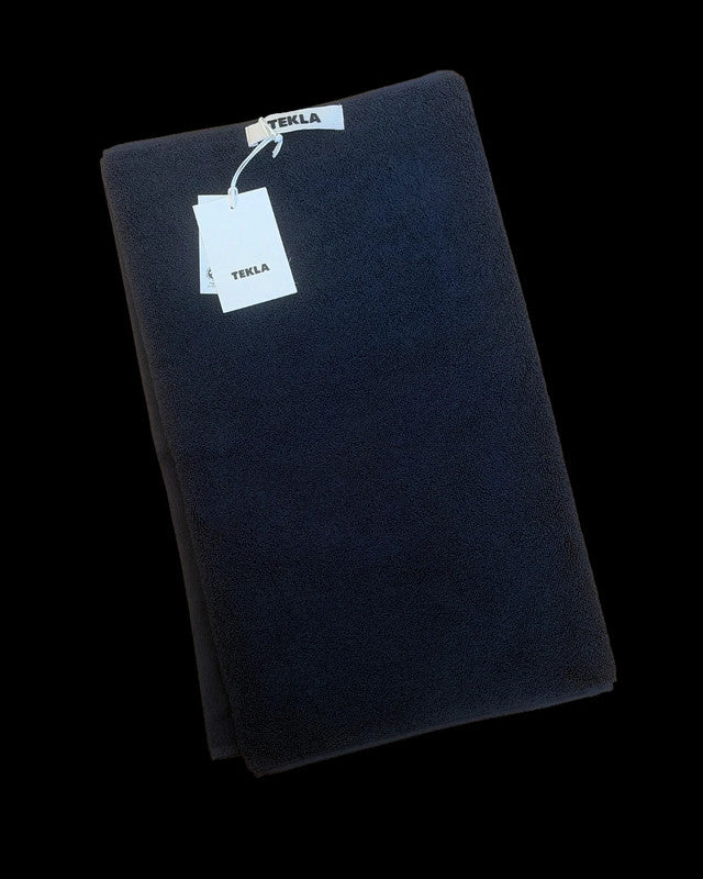 TEKLA navy hand towel 50x90cm in Night Blue, soft cotton material.