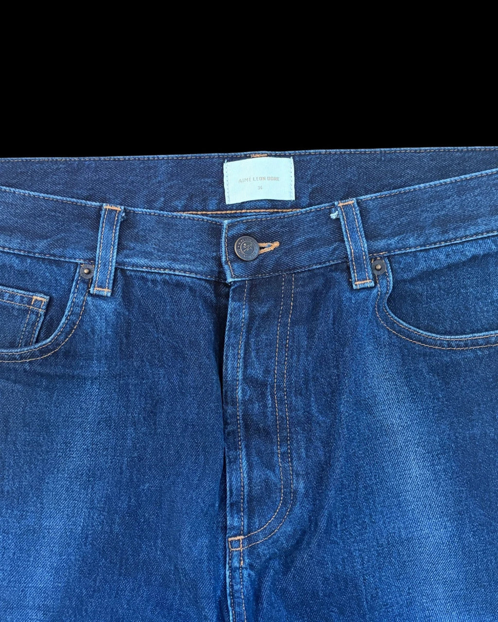 Aime Leon Dore navy straight jeans with subtle crease detailing and classic fit.