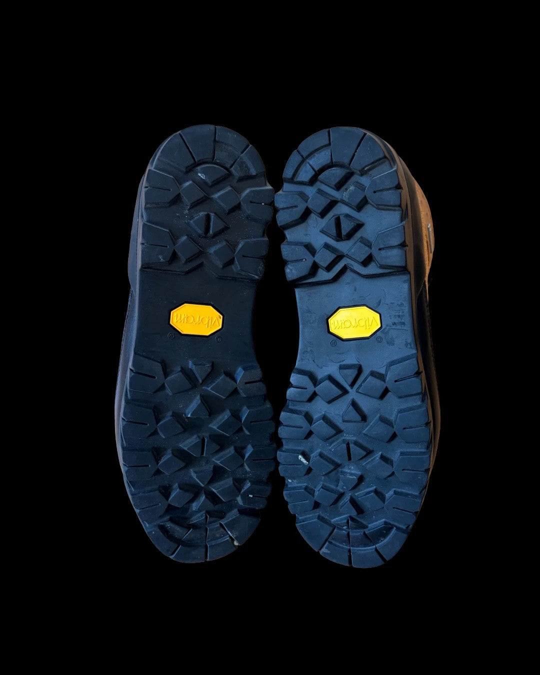 Stüssy x Timberland brown and orange hiking sandals with logo detailing and rugged sole.
