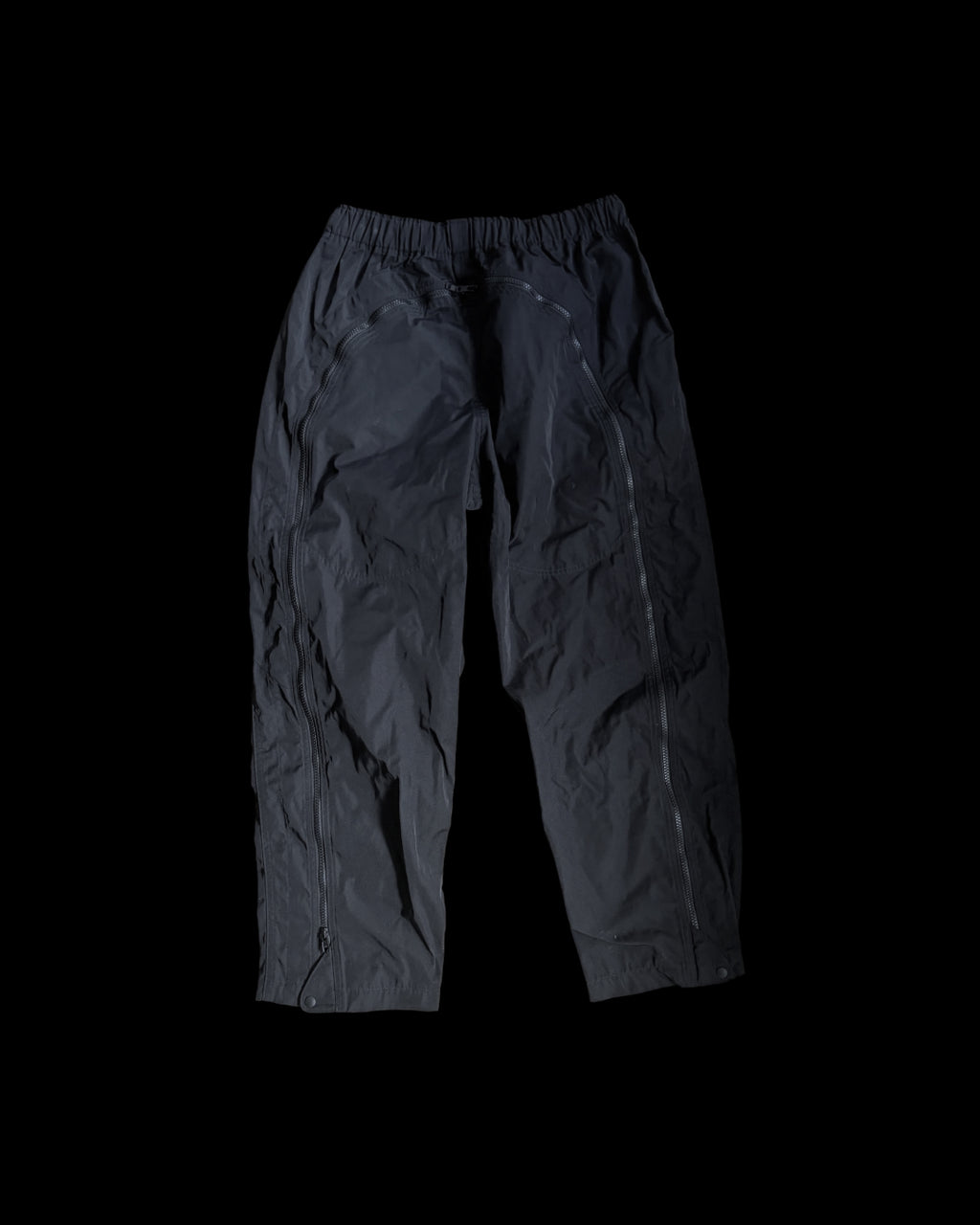 South 2 West 2 black activewear trousers, featuring logo details and premium material.