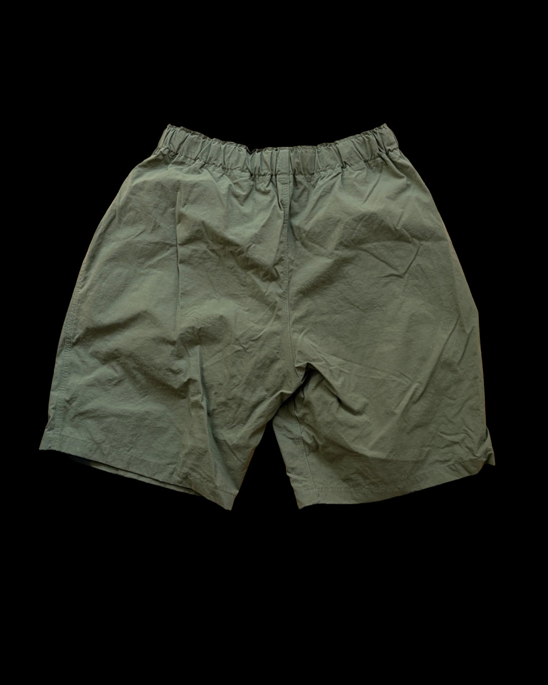 South2 West8 khaki shorts with subtle green tones and logo detail.